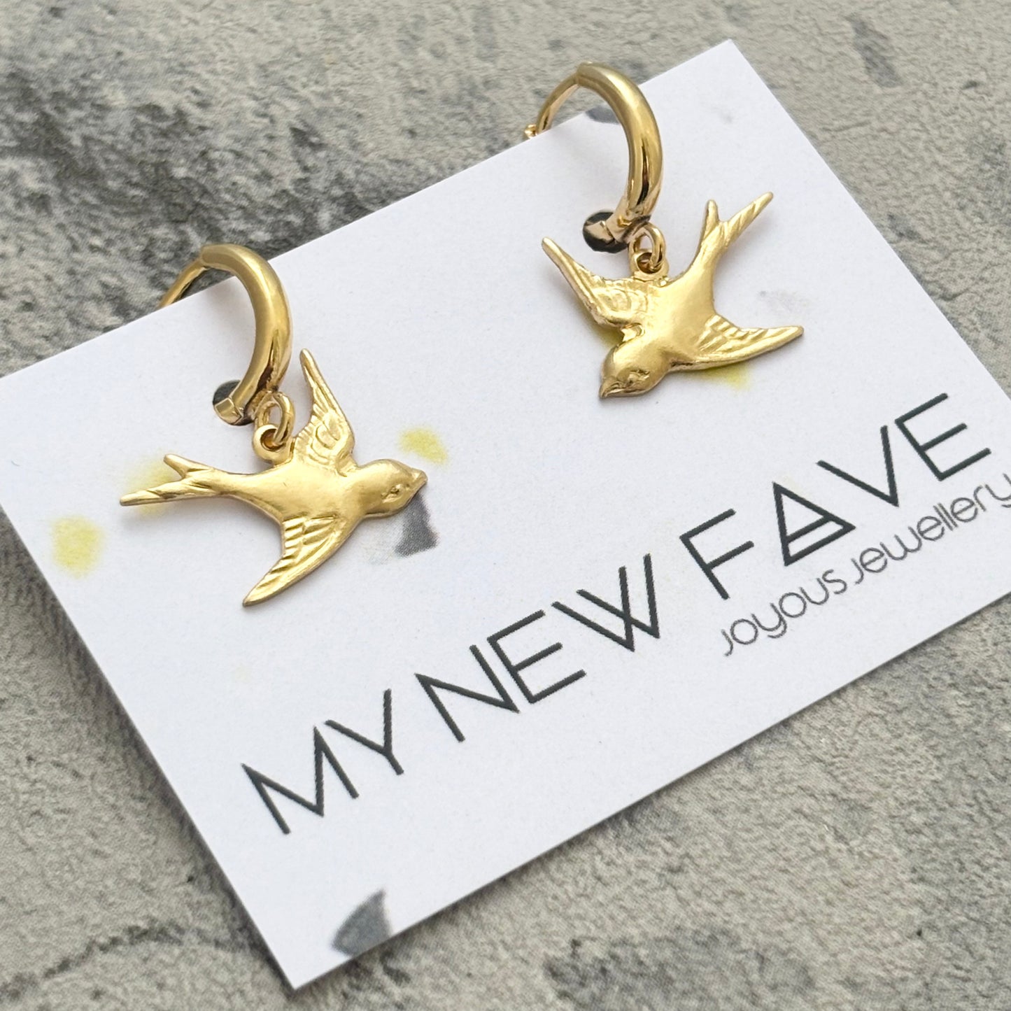 Swallow tattoo style earrings